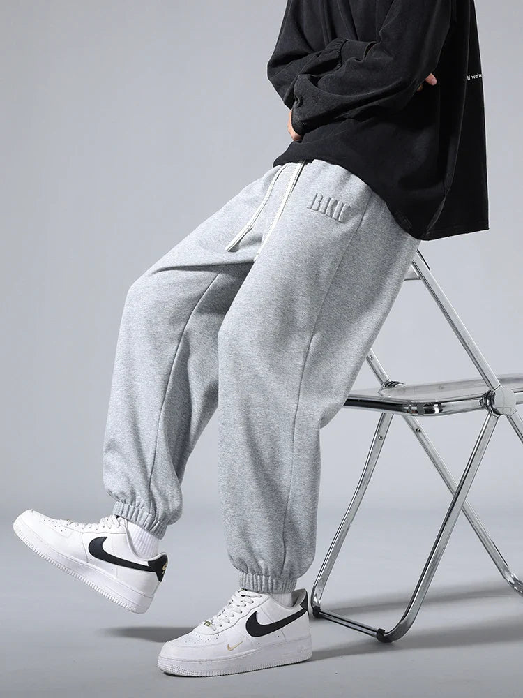 Men’s jogger pants with drawstring waist and ribbed cuffs.